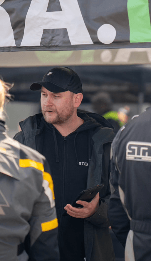 Jimmy Sorting talking to riders at an event